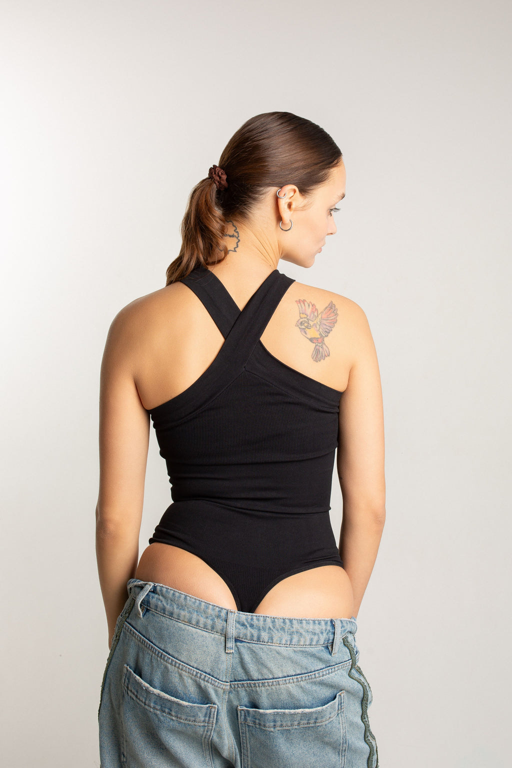 CROSSOVER HALTER BODYSUIT